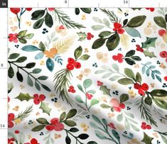 a white fabric with red and green leaves on it