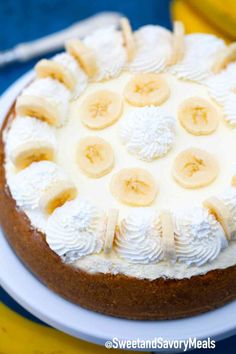 there is a cake with bananas on it