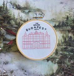 a hand embroidered picture of a grand budapest hotel