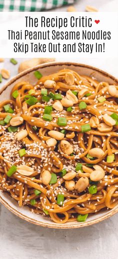 a bowl filled with noodles and sesame seeds