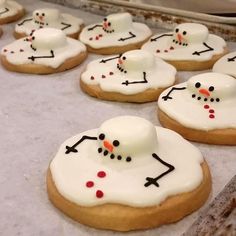 decorated cookies are lined up on the table