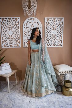 Bubbles - Powder Blue Indian Bridal Lengha Choli w/ Gota & Mirror work Let the fairy dust drizzle all upon your future with sparks of joy this beautiful blue lengha is bound to bless you with! Scoop neck georgette choli w/ Rajasthani Gota work Lightweight georgette choli Minimalistic scoop neckline Princess cut for the right fit Graceful mirror embroidery Intricate Rajasthani Gota Patti Gorgeous low neckline at back Blue georgette lehenga w/ mirror & Gota embroidery Breathable blue georgette fabric Flowy skirt achieve w/ yards of fabric Overlayered embroidered net fabric Reflective mirror work runs all over Embellished waistband & hemline Beaded Dori closure at sid-seam Glamourous net dupatta w/ Gota Patti & mirror work Weightless powder blue tulle net Delicate Rajastani Patti handwork Stu Indian Bridal Lengha, Blue Georgette Lehenga, Blue Bridal Lehenga, Gota Patti Lehenga, Lehenga Blue, Bridal Lengha, Georgette Lehenga