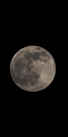 the full moon is shown in black and white