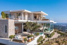 a modern house overlooking the hollywood hills