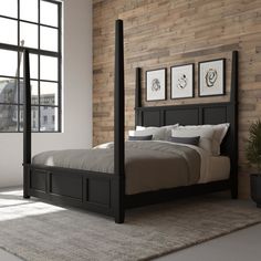 a bedroom with wood paneled walls and a large bed in the center, along with two planters on either side of the bed