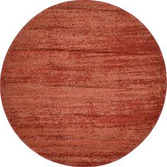 a round red rug on a white background