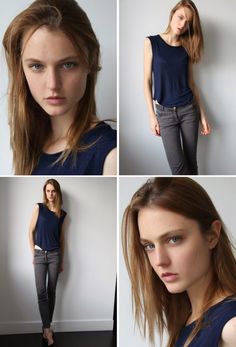 the model is posing with her hands on her hips and looking at the camera while wearing jeans