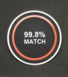 a black and orange sticker with the words 99 8 % match written on it