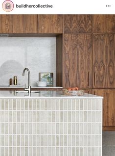 a kitchen with wooden cabinets and white counter tops