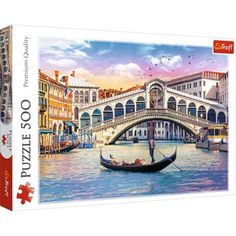 a jigsaw puzzle box with a painting of a gondola in venice