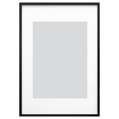 a black and white photo frame hanging on the wall with a blank space in it