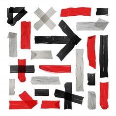 various pieces of torn paper with black and red strips