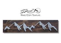 three paper birds are hanging on a wooden board with the words hard copy template written in white