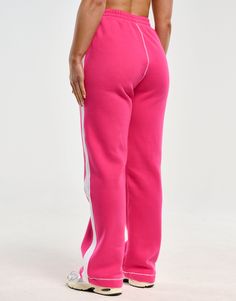 Loved by all for their cosiness and dependability. The Blur Flare Sweatpants are the perfect basics to help you get more out of your athleisure - Regular Waisted. Mid-rise waistband - Fabric is cotton mix for warmth and softness - Waist pockets - Embroidered ECHT Logo - Designed for low movement activities 60% Cotton, 40% Polyester Skye is wearing size Small. She is 170cm (5'6") tall with an 33" bust, a 25" waist and 36" hips. Pink Sweatpants With Ribbed Waistband, Sporty Pink Sweatpants With Ribbed Waistband, Sporty Pink Loungewear Pants, Sporty Pink Lounge Pants, Sporty Straight Leg Bottoms With Ribbed Waistband, Sports Sweatpants With Elastic Waistband, Sports Straight Sweatpants With Elastic Waistband, Sports Sweatpants With Elastic Waistband And Straight Cut, Straight Sweatpants With Elastic Waistband For Sports