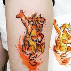 a person with a tattoo on their leg that has a drawing of a cartoon character