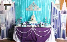 a frozen princess birthday party with purple and blue decorations