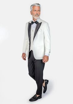 This Alabaster White Twill Tuxedo is the epitome of fashion style and sophistication. Crafted with meticulous attention to detail, this custom-made tuxedo will be a stunner. Enjoy the ultra formal look with this exquisite white tuxedo, fully customizable for you. Black satin peak lapels and accents distinguish this one button look - well paired with a black or white vest underneath. Alabaster White, Custom Made Suits, Blue Tuxedos, White Tuxedo, White Vest, Black Bow Tie, Body Posture, Body Proportions, Tuxedo Shirts