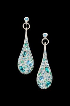 Caribbean dream earrings are dramatic and refreshing. Dazzling aquamarine and tourmaline sparkle from these white gold drop earrings. Dream Earrings, Tourmaline Earrings, Aquamarine Earrings, Bold Earrings