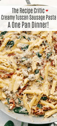 the recipe for creamy italian sausage pasta is in a skillet with spinach and cheese