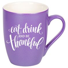 a purple coffee mug with the words eat drink and be grateful on it's side