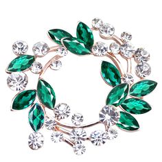 PRICES MAY VARY. Sparkle wreath style.This charming brooch features a detailed leaf floral wreath design,it adorned with clear crystal rhinestones and marquise cut stones.Each piece is eye-catching and has a beautiful glimmer and shine! Size and material.This sparkling jewelry piece measures about 1.65 inch width x 1.55 inch length,a lightweight hollow out style,it is not too big or too weight on fabrics.Shining silvery toned alloy metal base. Many colors available.Available in a multitude of be Floral Wreath Design, Sparkly Jewelry, Sparkle Jewelry, Pink Turquoise, Elegant Flowers, Purple Crystals, Pink Sapphire, Clear Crystal, Crystal Rhinestone