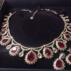 Want A Million Dollars Jewelry Set For A Steal ? Then This Beautiful All Around Authentic Signed Swarovski Necklace Is It!! Just As Beautiful As Real Dress No One Will Ever Know Unless You Tell! Comes With Matching Earrings. Perfect For A Night Out Or A Formal Lunch/Dinner. Comes With Matching Earrings ($310) And Ring Size 55 ($280) Already Priced To Sell. Make A Reasonable Offer. New In Box Red Costume Jewelry Necklace With Matching Earrings, Luxury Red Bridal Necklace With Cubic Zirconia, Luxury Red Crystal Jewelry Sets, Elegant Red Rhinestone Necklace, Evening Red Rhinestone Necklace, Swarovski Tiara, Princess Necklace, Necklace Collar, Swarovski Necklace