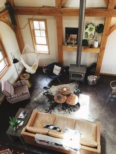 an aerial view of a living room with wood burning stove