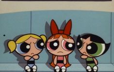 the powerpuff girls are standing next to each other in front of a wall