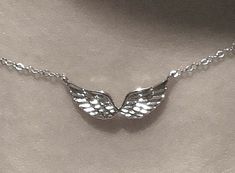 willow hale | not my photo Angel Jewelry Aesthetic, Angel Necklace Aesthetic, Diamond Necklace Aesthetic, Necklace Aesthetic Silver, Silver Necklace Aesthetic, Angel Accessories, Necklace Aesthetic, Wings Necklace, The Bling Ring