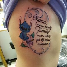 a woman with a tattoo on her stomach that says, ohana means family to me