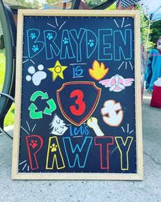 a sign that says brayden is 3 let's pawty