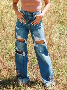 Rise: 12.5” Inseam: 33.5” 100% Cotton Model is 5’2 wearing a size 1 Western Jeans Ripped, High Waisted Distressed Jeans Outfit, Ripped Cowgirl Jeans, Bellbottom Pants Women, Wedtern Jeans, Ripped Western Jeans, Distressed Bootcut Jeans, Cute Womens Jeans, Womens Jeans Western