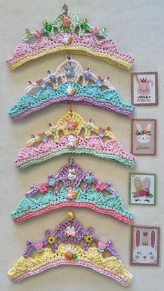 crocheted hair clips are arranged in the shape of princess tiaras and crowns