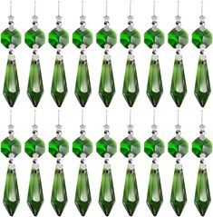 PRICES MAY VARY. PACK OF 20: Package includes 20 pieces optical crystal chandelier prisms. Enough for your spare or replacement. QUALITY MATERIAL: These green icicle prisms are made of crystal glass, with silver Bow tie Connectors, easy to bend to fit your chandelier. SPARKLING IN THE SUN: These crystal u drop prisms are very clear and they do cast rainbows when in the sun. CRYSTAL CURTAIN PENDANTS SIZE: Main bottom prism length: Approx 37mm/1.5inch; Octagon beads: Approx 14mm/0.55inch. As pictu Silver Bow Tie, Crystal Curtains, Lamp Parts, Prisms, Sculptures & Statues, Hanging Pendants, Crystal Chandelier, Beautiful Decor, Crystal Pendant