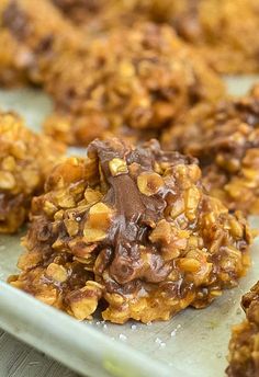 cookies with chocolate and nuts on a plate