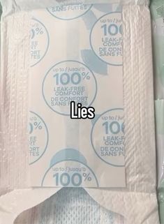 a pack of tissues sitting on top of a box with the words lies written in it