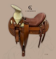 a brown and white horse saddle with a cream vase on it