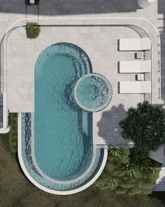 an aerial view of a swimming pool and patio