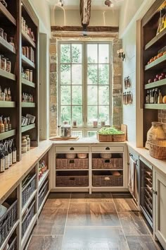 a kitchen filled with lots of open shelves