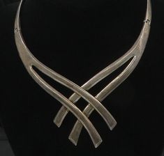 "MIGUEL PINEDA MEXICO 925 Silver - Vintage Rare Heavy Collar Necklace - NE2920  MIGUEL PINEDA MEXICO 925 Silver - Vintage Rare Heavy Collar Necklace - NE2920  Jewelry Type:         Necklace   Metal Type:            925 Silver   Metal Size:             5\" Length  4.5\" Width  2.25\" Height    Stone Type:            N/A  Condition:              N/A  Jewelry Weight:     126.7 Grams  PLEASE NOTE: THIS ITEM IS PRE-OWNED. ALTHOUGH MOST ITEMS ARE IN VERY GOOD CONDITION, SOME MAY NEED CLEANING AND/OR M Clear Pictures, Metal Necklaces, Collar Necklace, Pendant Necklaces, Jewelry Art, Types Of Metal, Metallic Silver, 925 Silver, Pendant Necklace