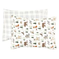 two pillow cases with animals on them in white and green plaid fabric, one has an animal print