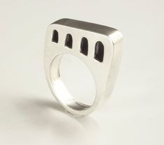 Everyone should have at least one silver statement ring in their jewelry collection. This architectural ring is created by my son Andrea Tuse from The House Of Stones and Metal. Inspired by his home town in Abruzzo Italy. It is hand fabricated with sterling silver and has a lovely minimalist style. Great for everyday and gift giving.Materials: sterling silverFinish: It has a satin finish and comes with a patinaBand width: approximately 3/8 inchesAvailable sizes: US 6-12Fabrication 1-2 weeks fabr Architectural Rings, Abruzzo Italy, Architectural Jewelry, Hollow Form, Home Town, Statement Ring Silver, Minimalist Style, Gift Giving, Sterling Ring