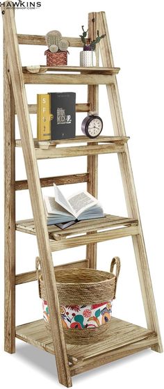 a wooden ladder shelf with books on it