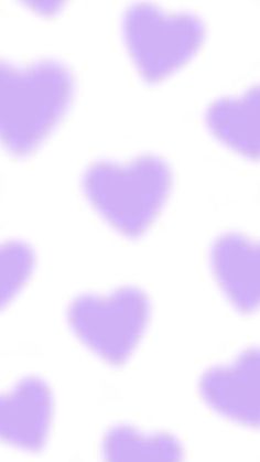 a white and purple spotted background with hearts