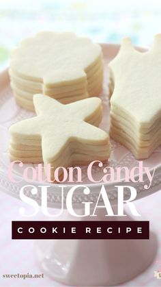 some cut out sugar cookies on a plate with the words cotton candy sugar cookie recipe