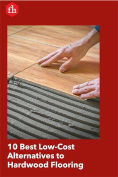 a person laying on top of a hard wood floor with the words 10 best low cost alternatives to hardwood flooring