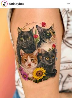 a woman's leg with cats and flowers on it