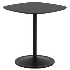 a black table with a round base