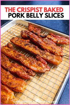 crispy baked pork belly slices on a cooling rack with text overlay that reads, the crispy baked pork belly slices