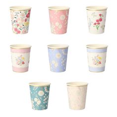 six different colored cups with floral designs on them